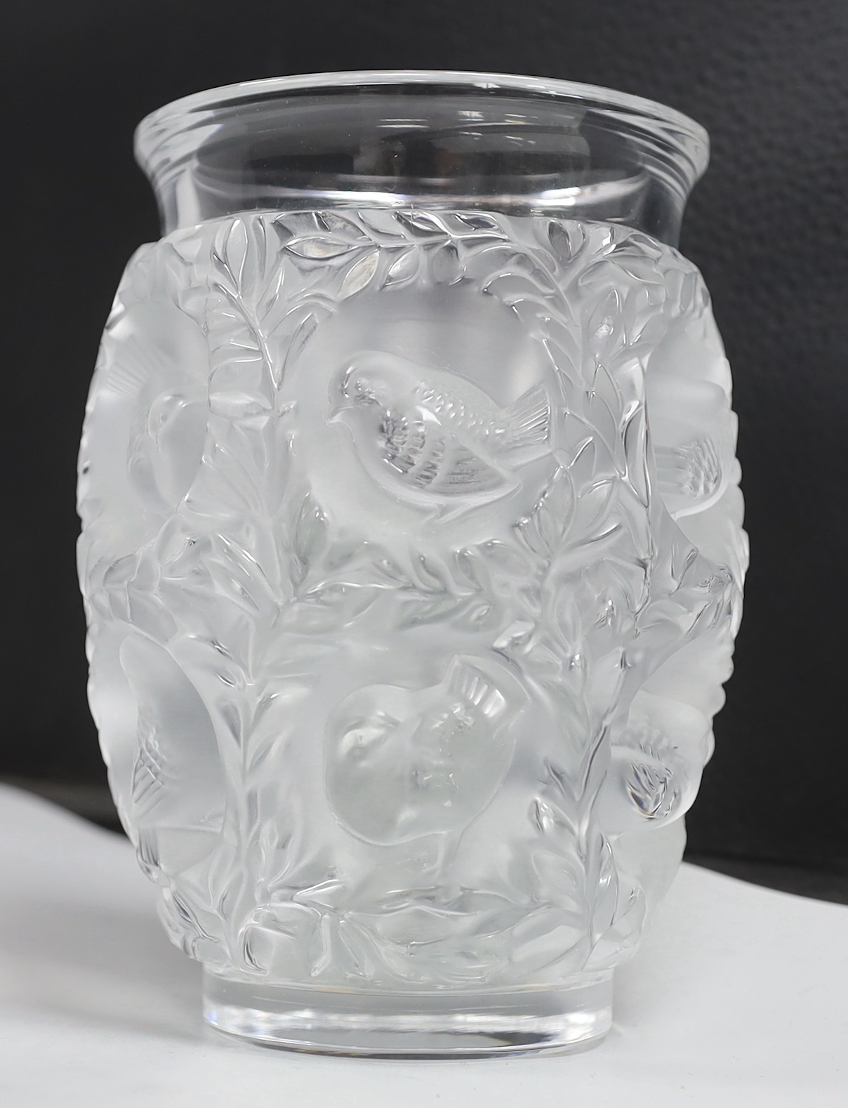A Lalique Bagatelle vase with inset birds amongst foliage, 17cm high